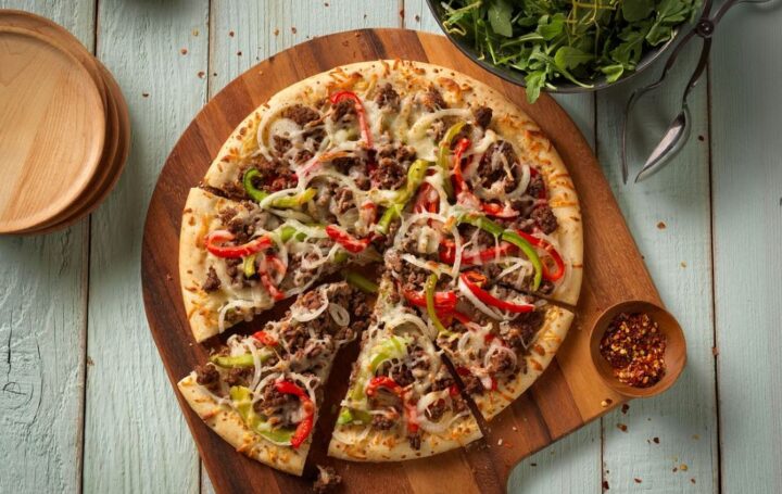 John’s Bar-B-Q Prepares Pizza “Your Way” with Brick Oven Curst 